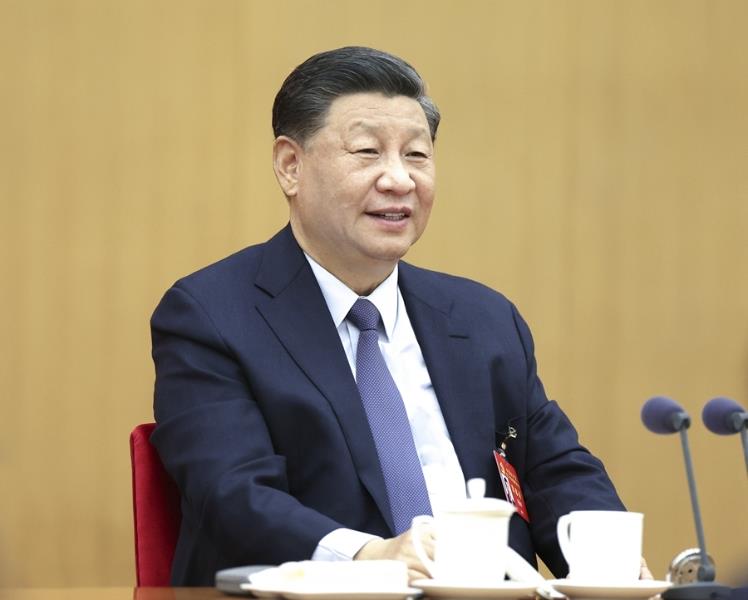 10月17日，習(xí)近平同志參加黨的二十大廣西代表團(tuán)討論。新華社記者 鞠鵬 攝